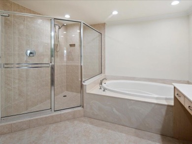 THIS CONDOMINIUM SOUNDS LIKE A DREAM COME TRUE. THE COMBINATION on Hammock Bay in Florida - for sale on GolfHomes.com, golf home, golf lot