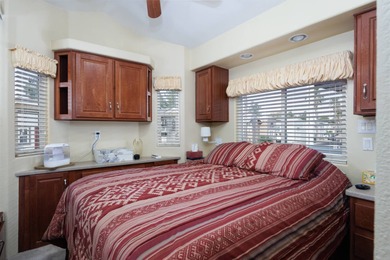 Wake up to breathtaking golf course views on Hole 14, where lush on Palm Creek Golf and RV Resort in Arizona - for sale on GolfHomes.com, golf home, golf lot