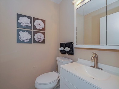 First Floor! Beautiful plank laminate floors w/ newer baseboard on Vero Beach South Golf Course in Florida - for sale on GolfHomes.com, golf home, golf lot