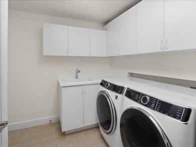 THIS CONDOMINIUM SOUNDS LIKE A DREAM COME TRUE. THE COMBINATION on Hammock Bay in Florida - for sale on GolfHomes.com, golf home, golf lot