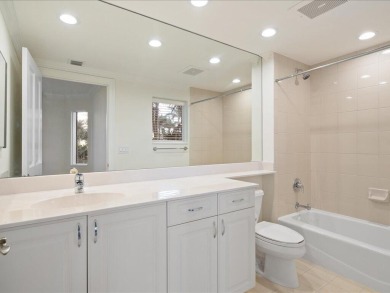 THIS CONDOMINIUM SOUNDS LIKE A DREAM COME TRUE. THE COMBINATION on Hammock Bay in Florida - for sale on GolfHomes.com, golf home, golf lot