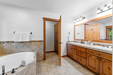 Discover luxury & convenience in this ski-in/ski-out cottage on Osprey Meadows at Tamarack Resort in Idaho - for sale on GolfHomes.com, golf home, golf lot