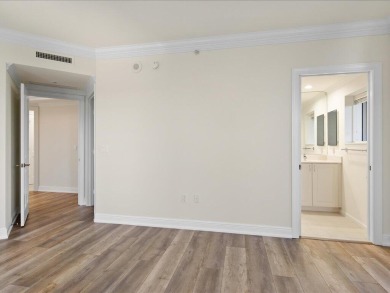 THIS CONDOMINIUM SOUNDS LIKE A DREAM COME TRUE. THE COMBINATION on Hammock Bay in Florida - for sale on GolfHomes.com, golf home, golf lot