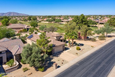 Uniquely positioned with picturesque views of both the on Sun City Grand Golf Couse and Club in Arizona - for sale on GolfHomes.com, golf home, golf lot