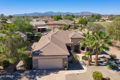 Uniquely positioned with picturesque views of both the on Sun City Grand Golf Couse and Club in Arizona - for sale on GolfHomes.com, golf home, golf lot