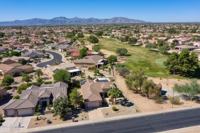 Uniquely positioned with picturesque views of both the on Sun City Grand Golf Couse and Club in Arizona - for sale on GolfHomes.com, golf home, golf lot