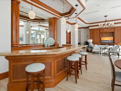 THIS CONDOMINIUM SOUNDS LIKE A DREAM COME TRUE. THE COMBINATION on Hammock Bay in Florida - for sale on GolfHomes.com, golf home, golf lot