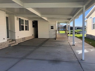 Lot #256 - 2 Bed /2 Bath + Den /1,568 Sq. Ft./$148,900.00 on Cypresswood Golf and Country Club in Florida - for sale on GolfHomes.com, golf home, golf lot