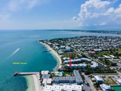 OCEAN VIEWS welcome you as you step into this updated condo and on Key Colony Beach Golf Course in Florida - for sale on GolfHomes.com, golf home, golf lot