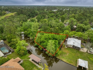 Gulf Hills Waterfront .44 acre lot. Neighborhood amenities on Gulf Hills Golf Club in Mississippi - for sale on GolfHomes.com, golf home, golf lot