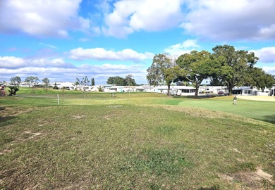 Check out this dream property!  Welcome to 322 St George Dr on Deer Creek RV Golf Resort in Florida - for sale on GolfHomes.com, golf home, golf lot