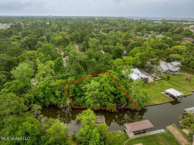 Gulf Hills Waterfront .44 acre lot. Neighborhood amenities on Gulf Hills Golf Club in Mississippi - for sale on GolfHomes.com, golf home, golf lot