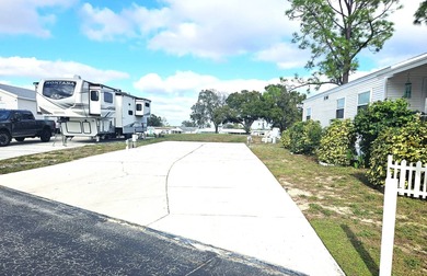 Check out this dream property!  Welcome to 322 St George Dr on Deer Creek RV Golf Resort in Florida - for sale on GolfHomes.com, golf home, golf lot