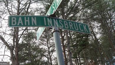 Prime location and exceptional value define this outstanding on Innsbruck Resort and Golf Club in Georgia - for sale on GolfHomes.com, golf home, golf lot