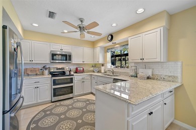 Welcome to this beautifully upgraded 3-bedroom, 3-bathroom home on Peridia Golf and Country Club in Florida - for sale on GolfHomes.com, golf home, golf lot