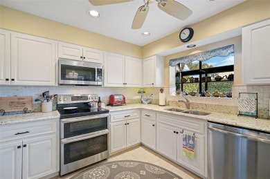 Welcome to this beautifully upgraded 3-bedroom, 3-bathroom home on Peridia Golf and Country Club in Florida - for sale on GolfHomes.com, golf home, golf lot