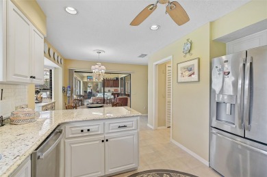 Welcome to this beautifully upgraded 3-bedroom, 3-bathroom home on Peridia Golf and Country Club in Florida - for sale on GolfHomes.com, golf home, golf lot