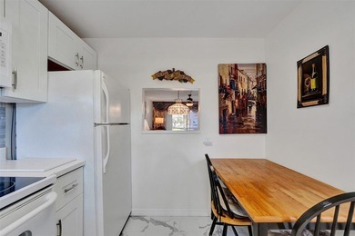 Beautiful serene water & golf course views in Sunrise Lakes on Sunrise Lakes Phase III in Florida - for sale on GolfHomes.com, golf home, golf lot