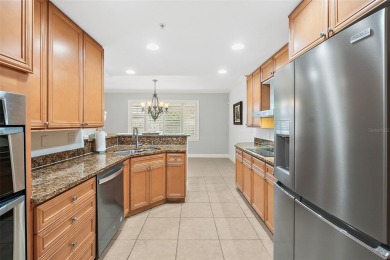 Condo living at its best!  This almost 2300 square ft condo with on Palm Harbor Golf Club in Florida - for sale on GolfHomes.com, golf home, golf lot