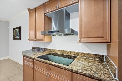 Condo living at its best!  This almost 2300 square ft condo with on Palm Harbor Golf Club in Florida - for sale on GolfHomes.com, golf home, golf lot