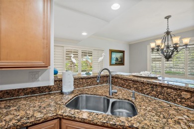 Condo living at its best!  This almost 2300 square ft condo with on Palm Harbor Golf Club in Florida - for sale on GolfHomes.com, golf home, golf lot