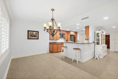 Condo living at its best!  This almost 2300 square ft condo with on Palm Harbor Golf Club in Florida - for sale on GolfHomes.com, golf home, golf lot
