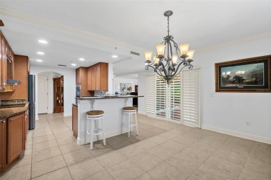 Condo living at its best!  This almost 2300 square ft condo with on Palm Harbor Golf Club in Florida - for sale on GolfHomes.com, golf home, golf lot