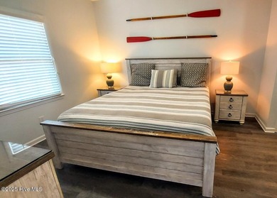 Welcome to this Coastal Retreat sitting within the prestigious on Sea Trail Golf Resort in North Carolina - for sale on GolfHomes.com, golf home, golf lot