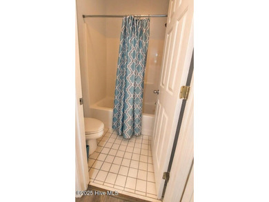 Welcome to this Coastal Retreat sitting within the prestigious on Sea Trail Golf Resort in North Carolina - for sale on GolfHomes.com, golf home, golf lot