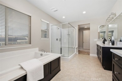 Step onto the inviting front porch and into a luxurious on RedHawk Golf Club in California - for sale on GolfHomes.com, golf home, golf lot