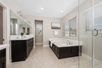 Step onto the inviting front porch and into a luxurious on RedHawk Golf Club in California - for sale on GolfHomes.com, golf home, golf lot