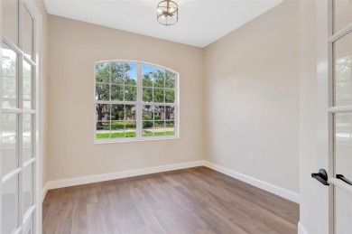 Welcome to this beautifully renovated 4-bedroom, 2.5-bathroom on The River Club in Florida - for sale on GolfHomes.com, golf home, golf lot