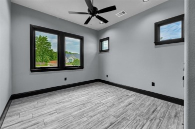 Ultra-modern new construction home located in the gated on Tanglewood Resort in Texas - for sale on GolfHomes.com, golf home, golf lot
