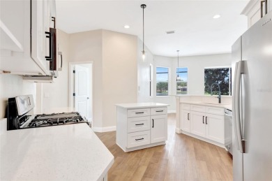 Welcome to this beautifully renovated 4-bedroom, 2.5-bathroom on The River Club in Florida - for sale on GolfHomes.com, golf home, golf lot