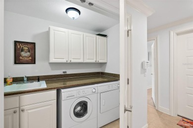 Condo living at its best!  This almost 2300 square ft condo with on Palm Harbor Golf Club in Florida - for sale on GolfHomes.com, golf home, golf lot