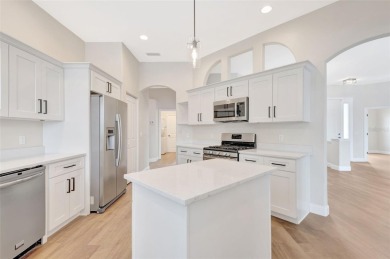 Welcome to this beautifully renovated 4-bedroom, 2.5-bathroom on The River Club in Florida - for sale on GolfHomes.com, golf home, golf lot