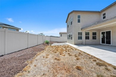 Step onto the inviting front porch and into a luxurious on RedHawk Golf Club in California - for sale on GolfHomes.com, golf home, golf lot