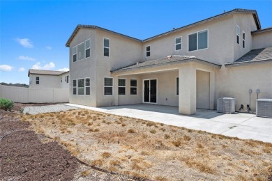 Step onto the inviting front porch and into a luxurious on RedHawk Golf Club in California - for sale on GolfHomes.com, golf home, golf lot