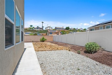 Step onto the inviting front porch and into a luxurious on RedHawk Golf Club in California - for sale on GolfHomes.com, golf home, golf lot