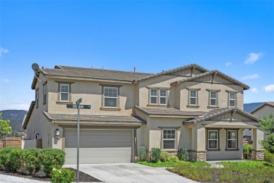Step onto the inviting front porch and into a luxurious on RedHawk Golf Club in California - for sale on GolfHomes.com, golf home, golf lot