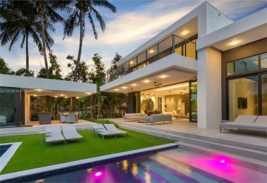 Contemporary Villa with modern finishes throughout and cozy on Miami Beach Golf Club in Florida - for sale on GolfHomes.com, golf home, golf lot