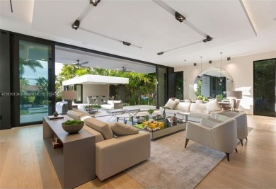 Contemporary Villa with modern finishes throughout and cozy on Miami Beach Golf Club in Florida - for sale on GolfHomes.com, golf home, golf lot