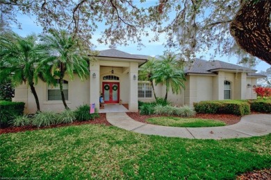Welcome to this beautifully updated 3-bedroom, 2-bathroom home on Sun n Lake Golf and Country Club in Florida - for sale on GolfHomes.com, golf home, golf lot
