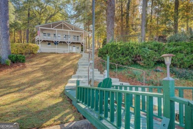 Panoramic big water views from this charming DEEDED lakefront on Turtle Cove Golf Course in Georgia - for sale on GolfHomes.com, golf home, golf lot