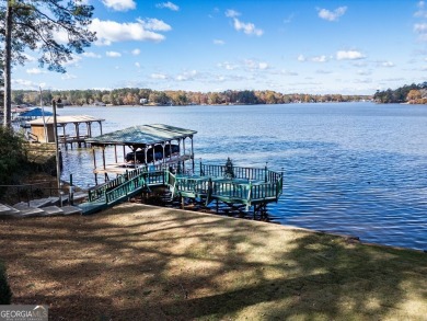 Panoramic big water views from this charming DEEDED lakefront on Turtle Cove Golf Course in Georgia - for sale on GolfHomes.com, golf home, golf lot