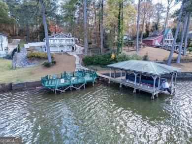 Panoramic big water views from this charming DEEDED lakefront on Turtle Cove Golf Course in Georgia - for sale on GolfHomes.com, golf home, golf lot