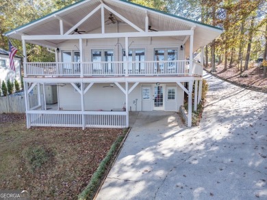 Panoramic big water views from this charming DEEDED lakefront on Turtle Cove Golf Course in Georgia - for sale on GolfHomes.com, golf home, golf lot