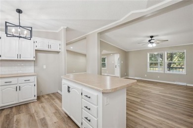Spacious, clean and move-in ready! Freshly painted, new kitchen on Linn Valley Lakes - Deer Trace Golf Course in Kansas - for sale on GolfHomes.com, golf home, golf lot