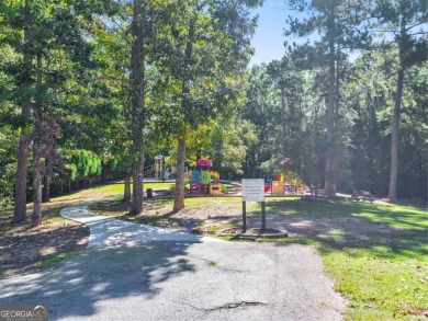 Beautiful wooded lot located in the sought-after Fairfield on Fairfield Plantation Golf and Country Club in Georgia - for sale on GolfHomes.com, golf home, golf lot