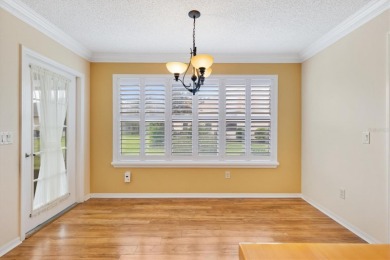 You will feel right at home in this well-appointed 3 Bedroom, 2 on The Links of Spruce Creek in Florida - for sale on GolfHomes.com, golf home, golf lot